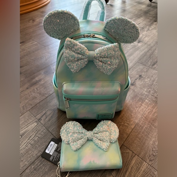 Loungefly Handbags - Loungefly Minnie Mouse sequins Bow mini backpack with matching wallet